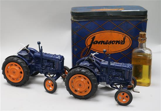 A live steam traction engine and two Chad Valley clockwork models of tractors